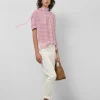Blusa manga corta y cuello anudado cuadros tonos rosa