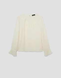Blusa manga larga tejido fluido beige con bordado floral