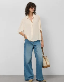 Blusa manga volante tejido fluido beige