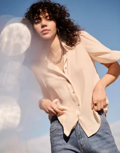 Blusa manga volante tejido fluido beige