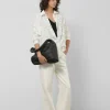 Blusón en voile de algodón blanco con fill coupé plumas
