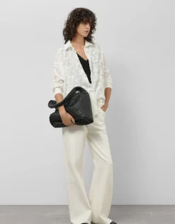 Blusón en voile de algodón blanco con fill coupé plumas