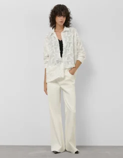 Blusón en voile de algodón blanco con fill coupé plumas