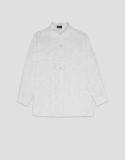 Blusón en voile de algodón blanco con fill coupé plumas