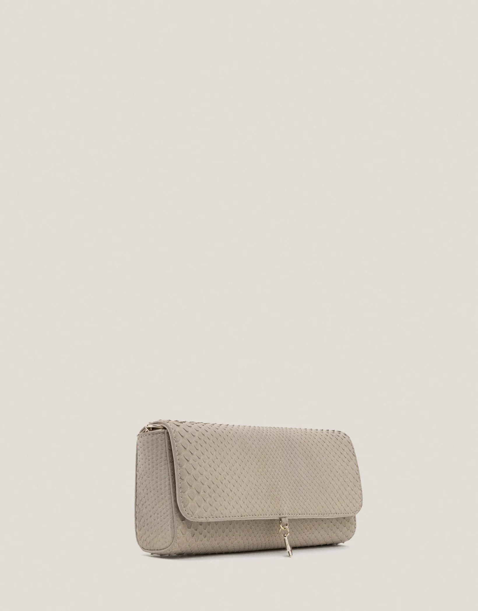 Bolso Clutch Ariana piel serpiente crudo