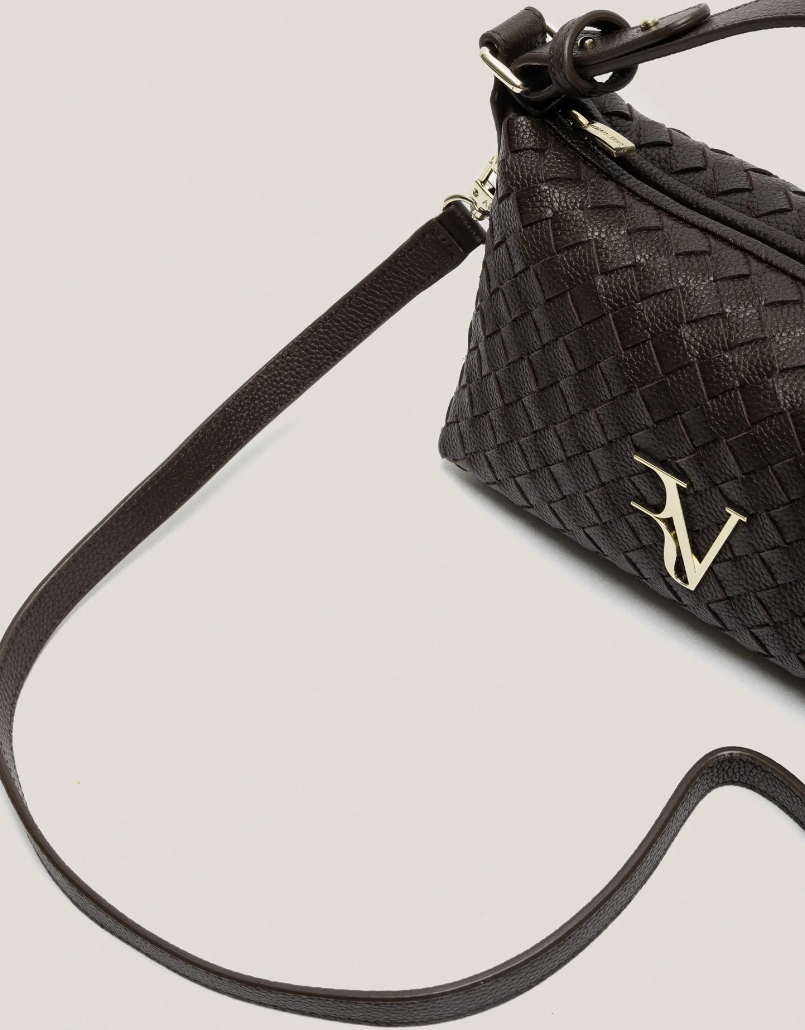Bolso de mano Erea Pouch piel trenzada marrón
