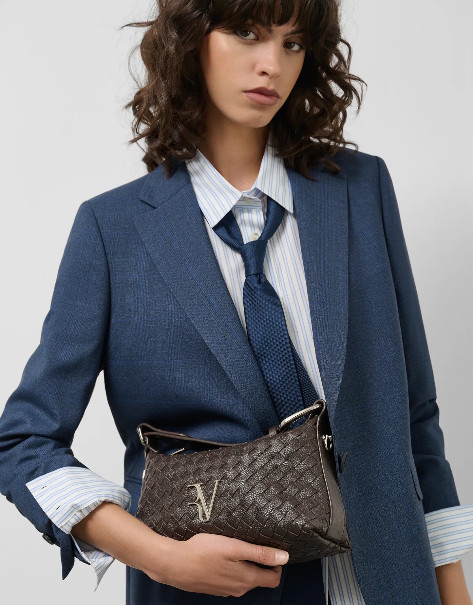 Bolso de mano Erea Pouch piel trenzada marrón