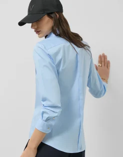 Camisa corte masculino celeste con logo bordado