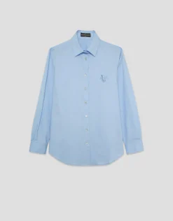 Camisa corte masculino celeste con logo bordado