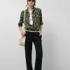 Camisa corte masculino negro estampado hojas verdes