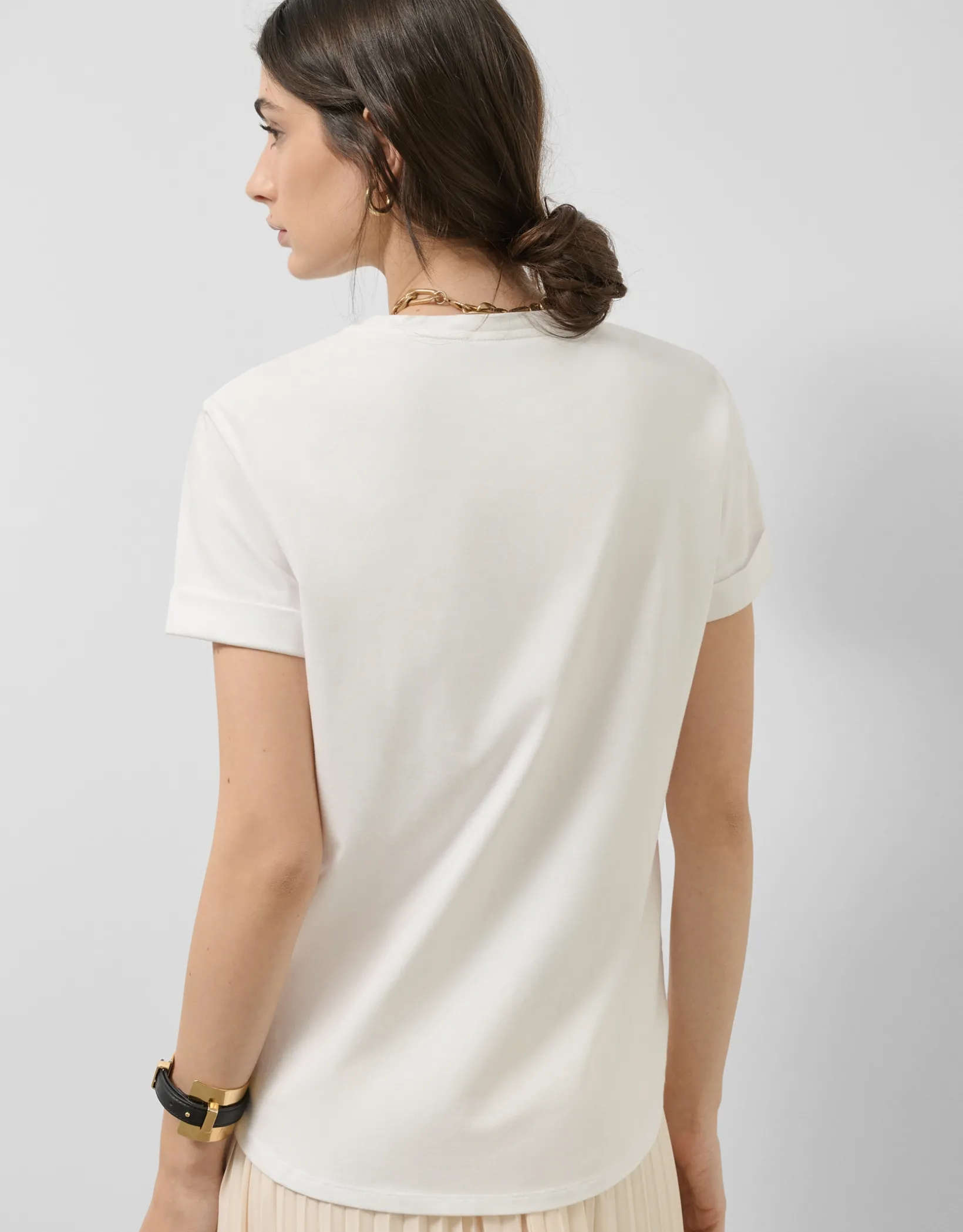 Camiseta oversize algodón blanco logo brillo dorado