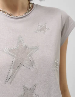 Camiseta punto ligero estampado estrellas plata