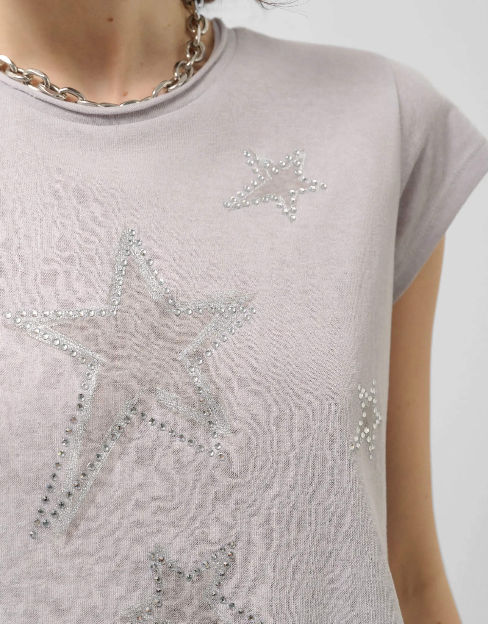 Camiseta punto ligero estampado estrellas plata