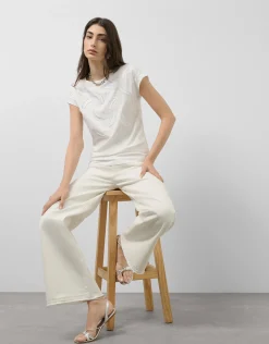 Camiseta sin mangas oversize blanca con bordado en delantero