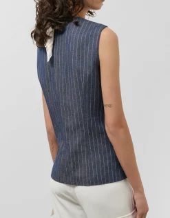 Chaleco azul vaquero con lino y perfil dorado