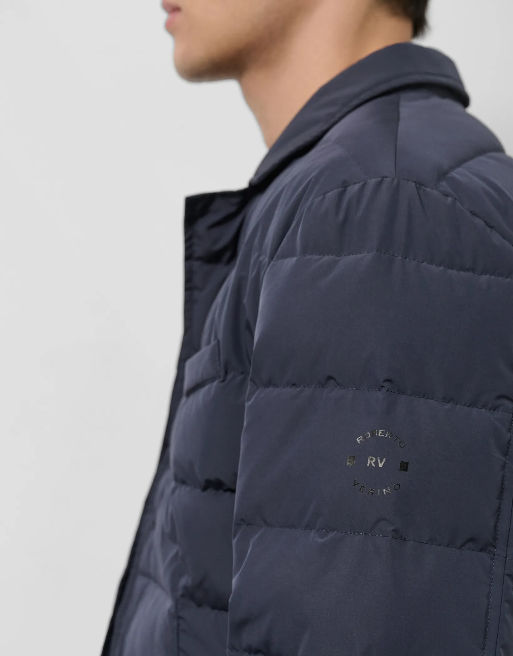 Chaqueta americana acolchada azul marino