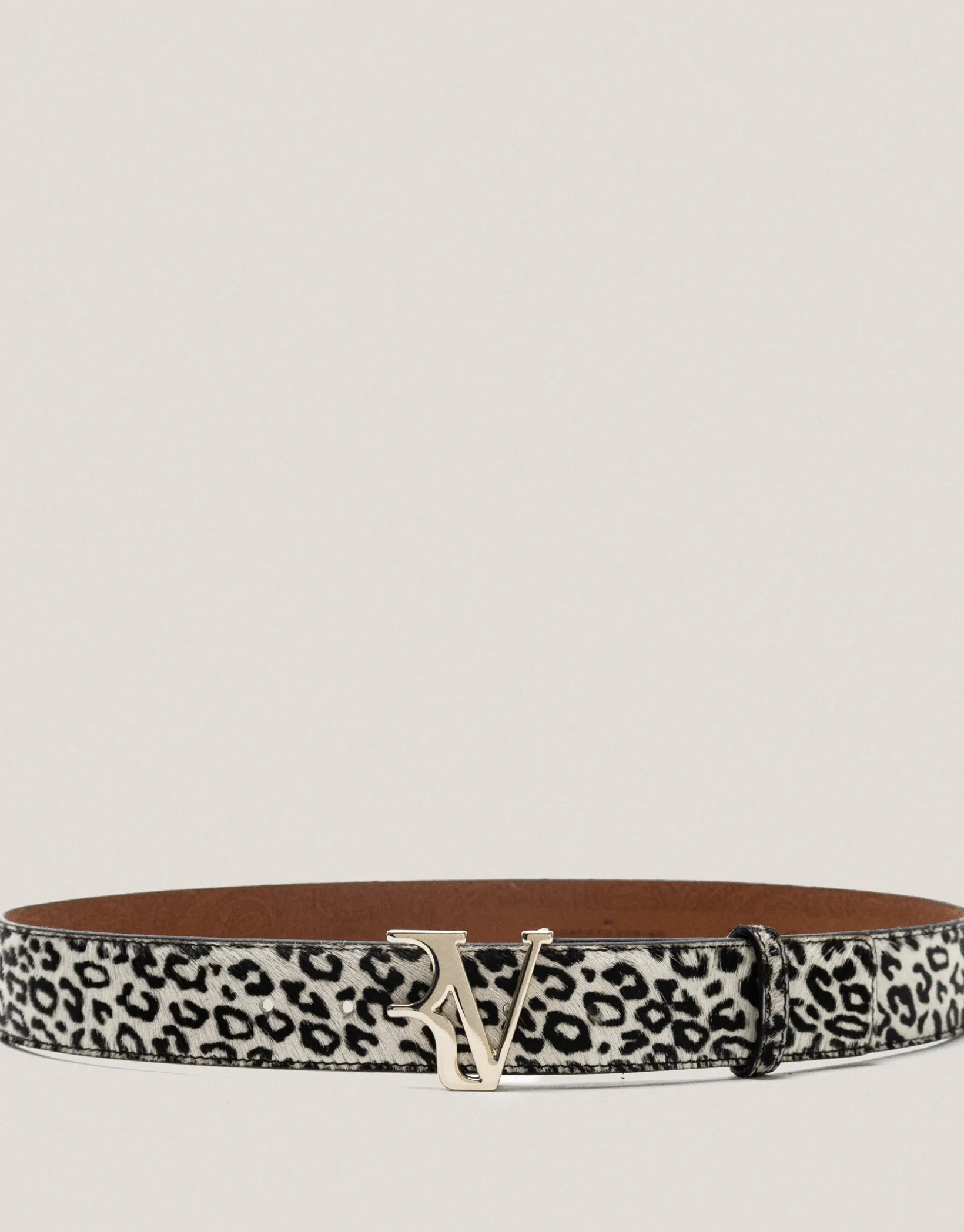 Cinturón en piel pelo animal print blanco y negro