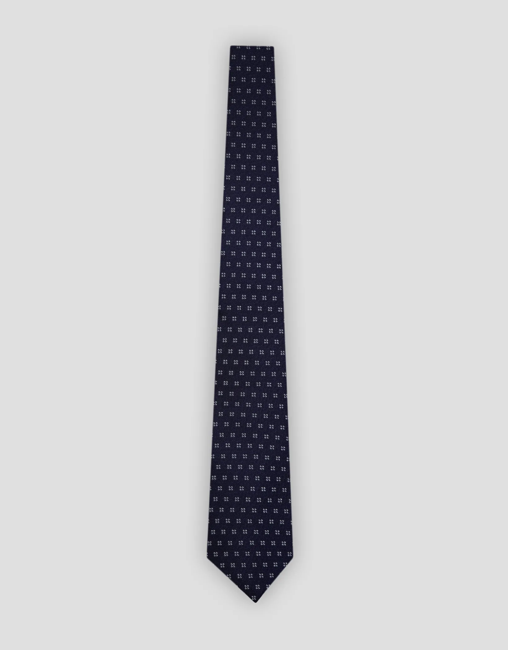 Corbata de seda azul con jacquard geométrico plata