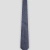 Corbata seda azul con jacquard cuadrados plata