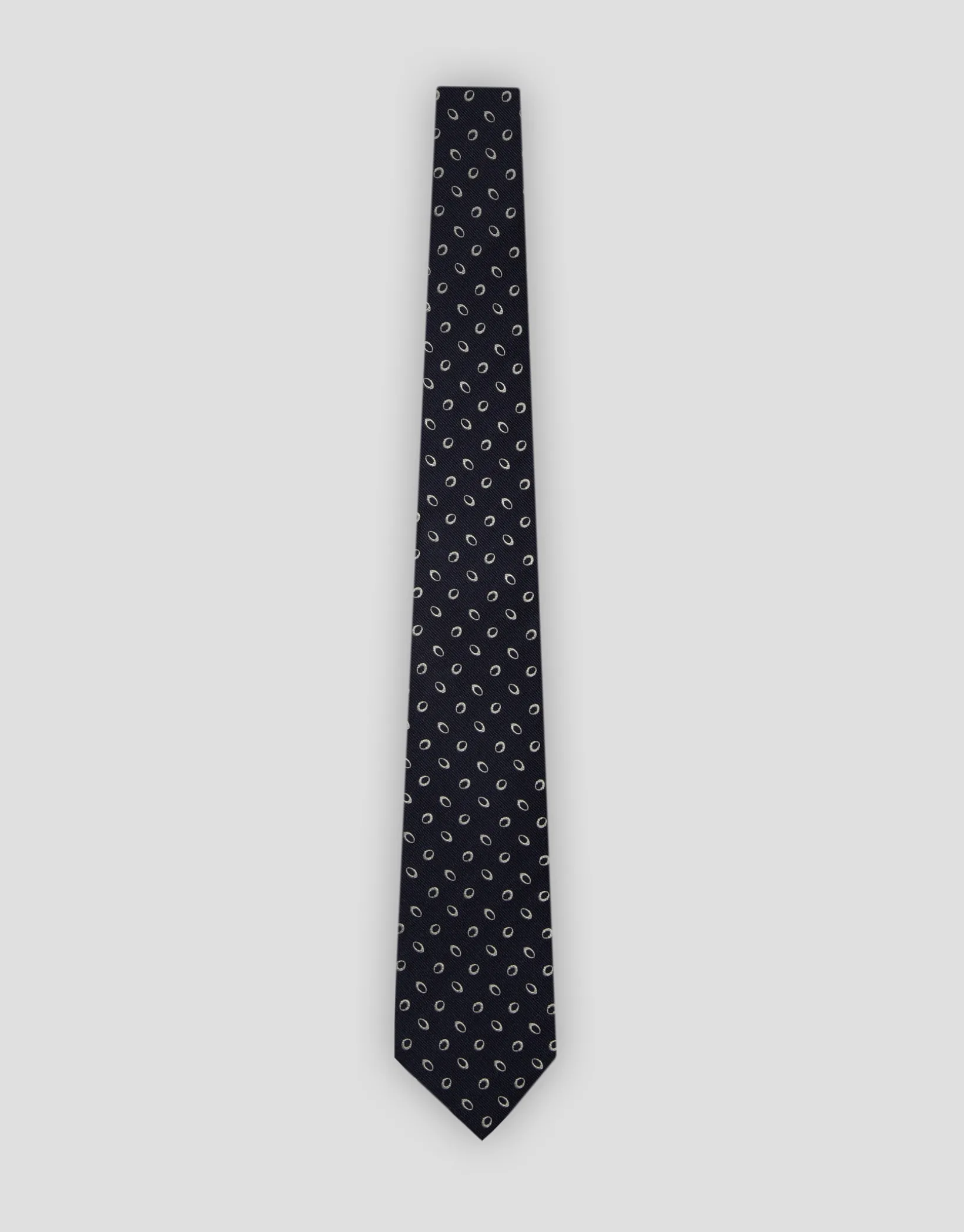 Corbata seda marino jacquard óvalos plata
