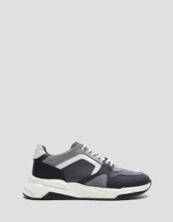 Deportiva estilo runner gris con suela track
