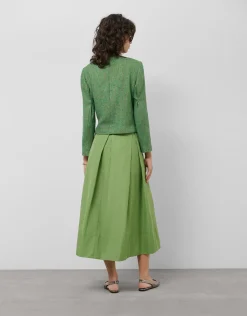 Falda larga en tafeta verde con abertura delantera