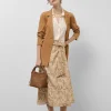 Falda midi estilo pareo en gasa estampado vegetal cámel