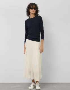 Falda midi plisada tejido fluido beige