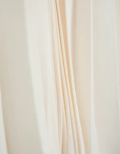 Falda midi plisada tejido fluido beige