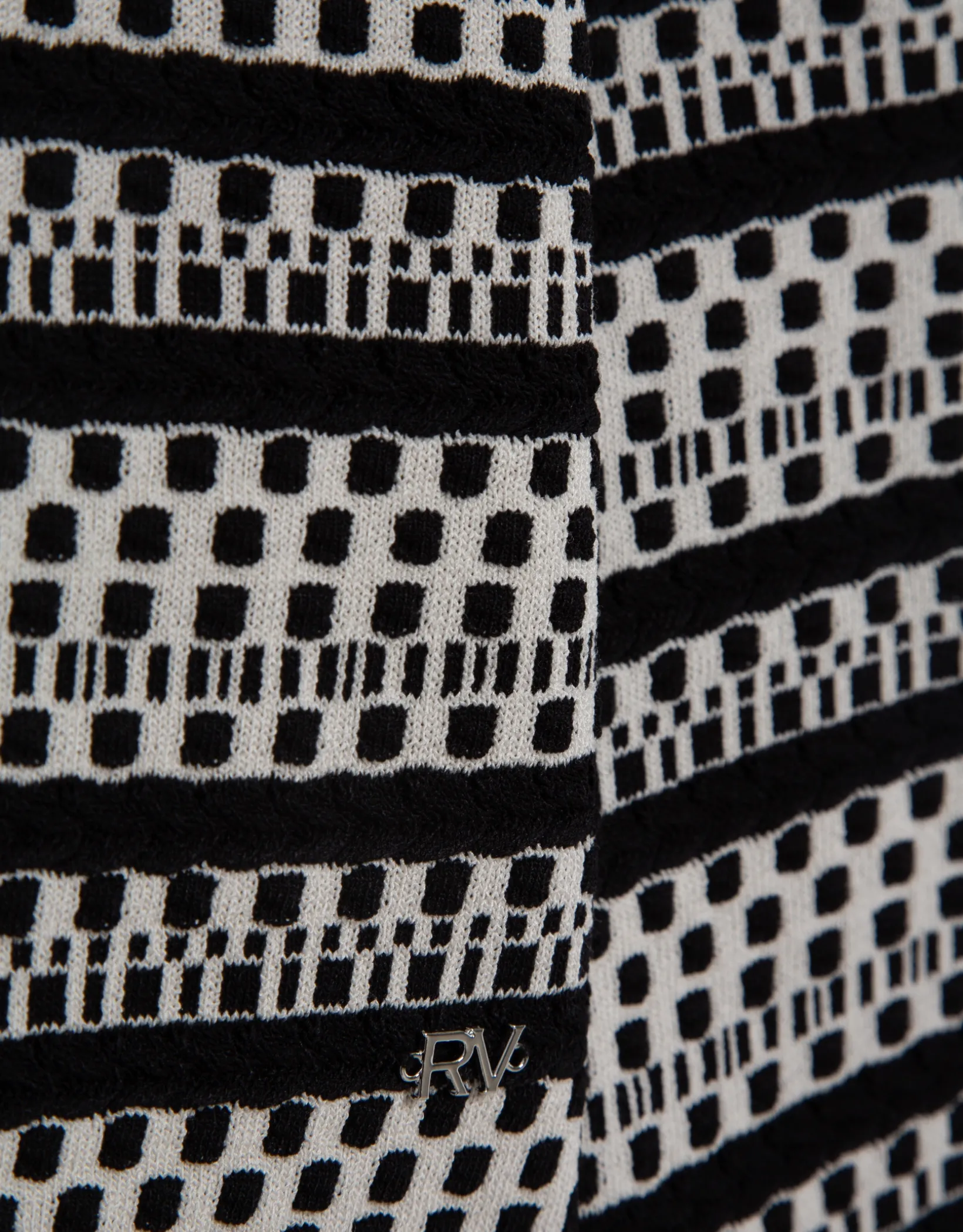 Jersey con intarsia geométrica blanco y negro