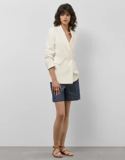 Pantalón bermuda en tejido vaquero con lino y perfil dorado