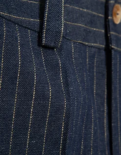 Pantalón bermuda en tejido vaquero con lino y perfil dorado