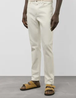 Pantalón denim regular color crudo