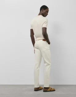 Pantalón denim regular color crudo