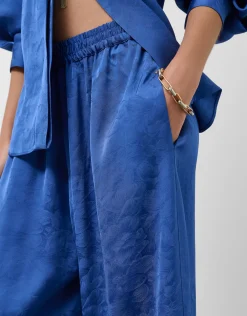 Pantalón palazzo azul intenso con damasco floral