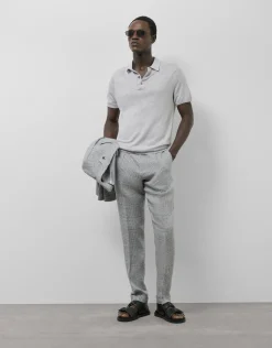 Pantalón pinzas lino cuadros grises y azules
