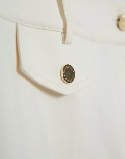 Pantalón pitillo crudo
