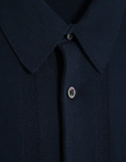 Polo abierto tricotado estructura marino