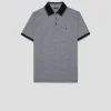 Polo jacquard geométrico marino y blanco