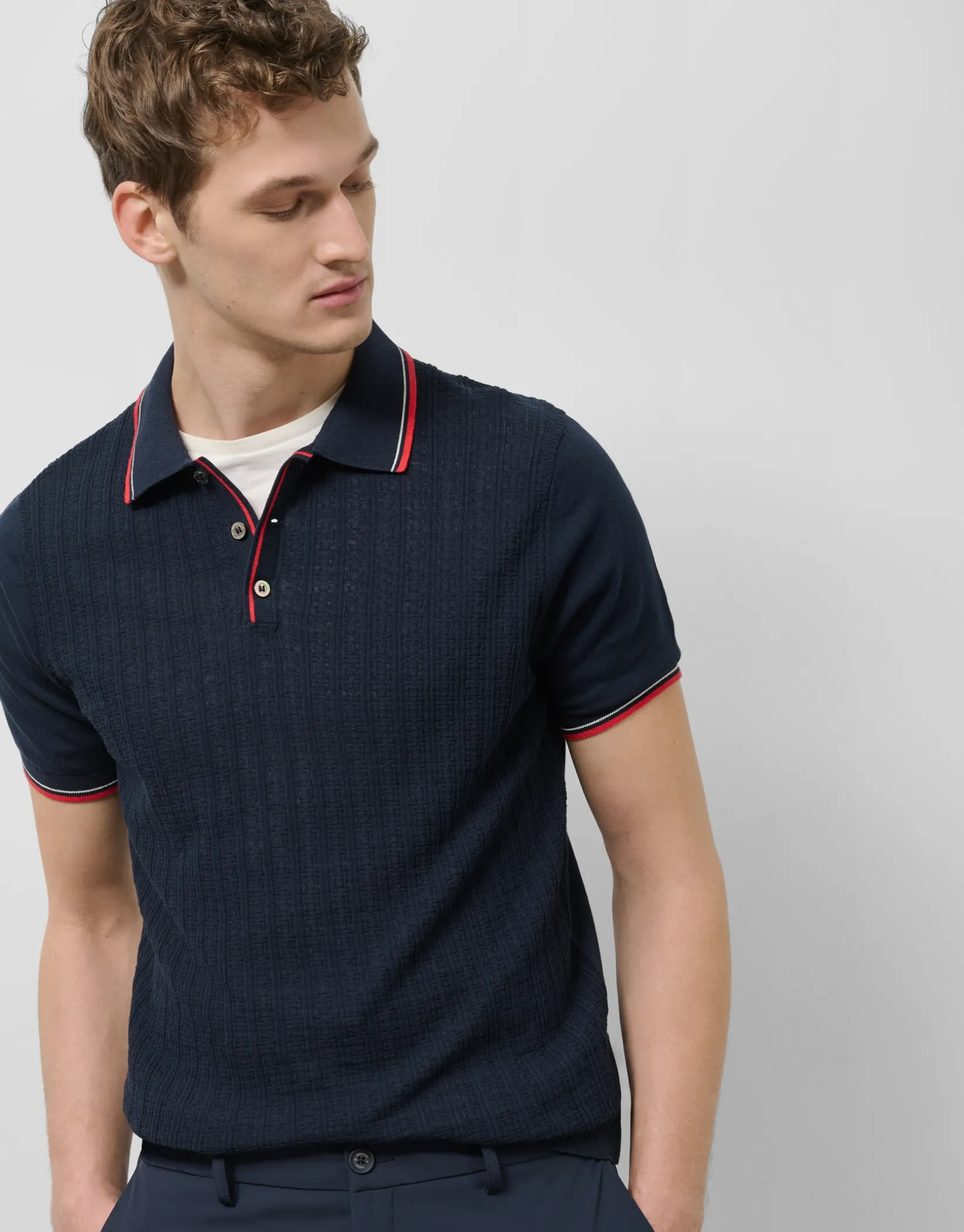 Polo tricotado marino estructura rayas