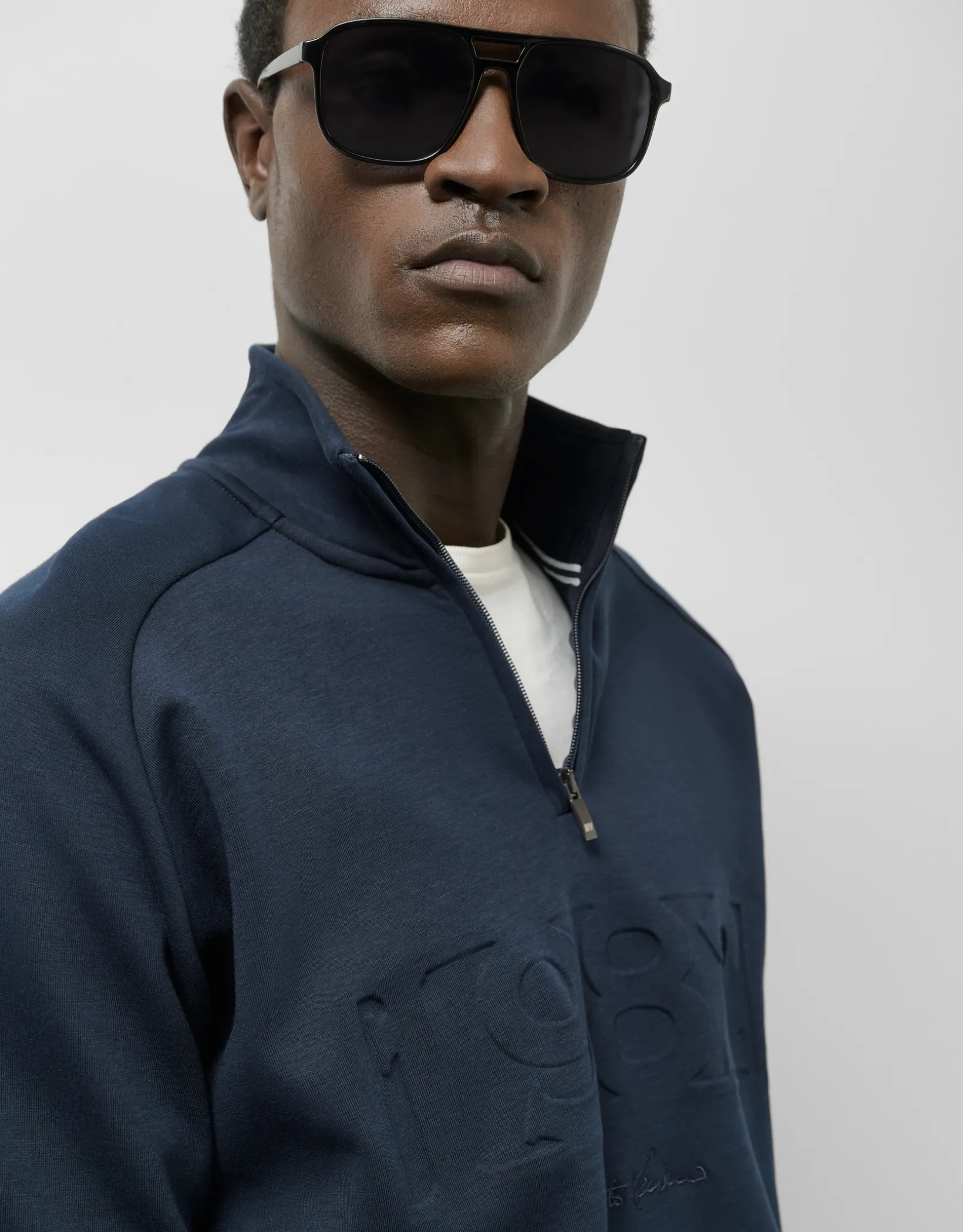 Sudadera media cremallera marina con logo