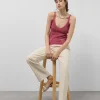 Top sisas punto calado con lúrex frambuesa