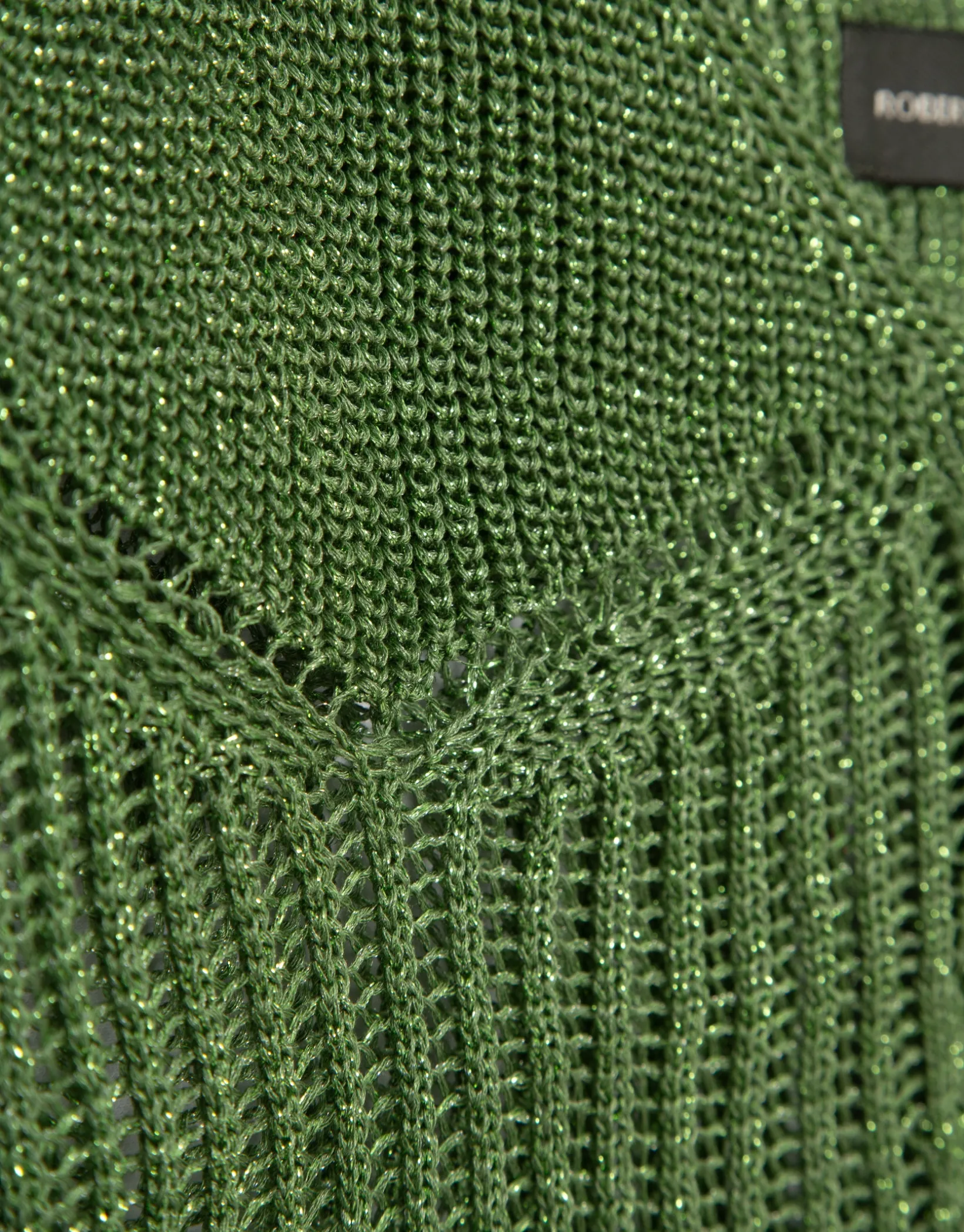 Top sisas punto calado con lúrex verde claro