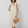 Vestido sisas en tejido fantasía blanco y plata