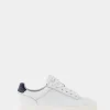 Zapatilla deportiva blanca talón azul