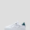 Zapatillas deportivas logo perforado piel blanca
